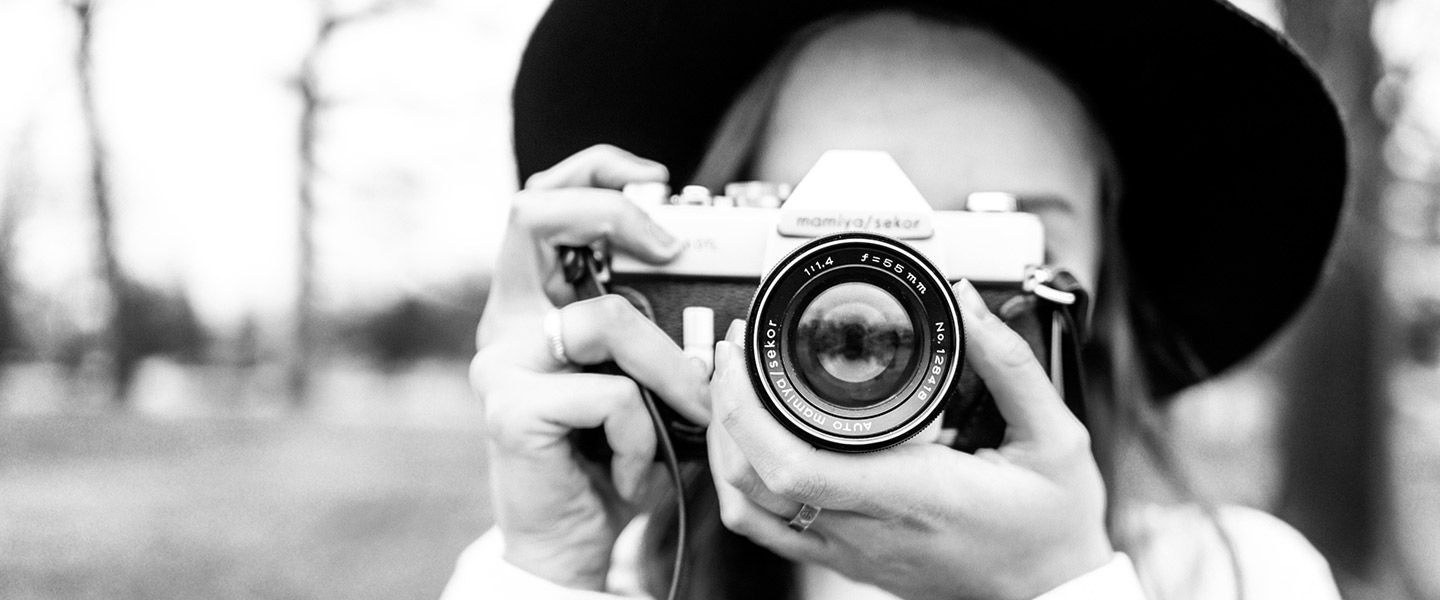 Frau mit Fotoapparat